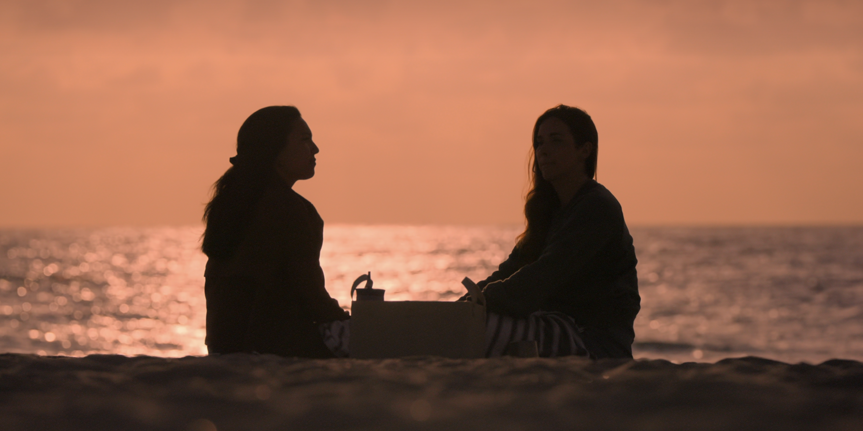 Haley and Pilar on a beach
